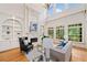 Elegant living room with high ceilings, fireplace, and built-in shelving perfect for entertaining at 3770 Riverly Trce, Marietta, GA 30067