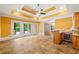 Living room with tile flooring, wet bar, and access to the pool area at 3770 Riverly Trce, Marietta, GA 30067