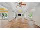 Open living room with tile flooring, multiple access doors, and recessed lighting at 3770 Riverly Trce, Marietta, GA 30067