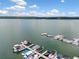 Aerial view of the boat docks with covered boat slips, offering easy access to the open lake at 1000 Delta Dr, Canton, GA 30114