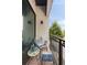 Balcony with seating, side table and views of lush surroundings at 22 Airline Ne St # 201, Atlanta, GA 30312