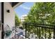 Cozy balcony featuring a seating area, plants, and views of surrounding trees and architecture at 22 Airline Ne St # 201, Atlanta, GA 30312