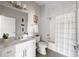 Bright bathroom with modern lighting, a large mirror, and sleek fixtures at 22 Airline Ne St # 201, Atlanta, GA 30312