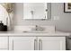 Contemporary bathroom vanity featuring a quartz countertop, modern faucet, and stylish mirror at 22 Airline Ne St # 201, Atlanta, GA 30312