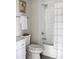 Well lit bathroom with a shower-tub combination and neutral color palette at 22 Airline Ne St # 201, Atlanta, GA 30312
