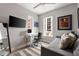Bright bedroom featuring a daybed, desk, and ample natural light from large windows at 22 Airline Ne St # 201, Atlanta, GA 30312