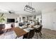 Open-concept living and dining area featuring modern décor, stylish lighting, and comfortable seating at 22 Airline Ne St # 201, Atlanta, GA 30312