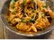 Delicious dumplings topped with sesame seeds and green onions, served in a flavorful sauce at 22 Airline Ne St # 201, Atlanta, GA 30312