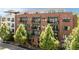 Beautiful red brick apartment building featuring multiple balconies and many large windows at 22 Airline Ne St # 201, Atlanta, GA 30312