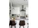 Modern kitchen with stainless steel appliances, white cabinets, and a breakfast bar at 22 Airline Ne St # 201, Atlanta, GA 30312