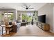 Open-concept living room with natural light, neutral decor, and a comfortable sectional sofa at 22 Airline Ne St # 201, Atlanta, GA 30312
