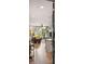 Open-concept living room with modern finishes, abundant natural light, and sleek hardwood flooring at 22 Airline Ne St # 201, Atlanta, GA 30312
