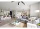 Spacious living room featuring a comfortable sectional sofa and an open view of the kitchen at 22 Airline Ne St # 201, Atlanta, GA 30312