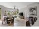 Bright living room with large windows, stylish furniture, and contemporary décor at 22 Airline Ne St # 201, Atlanta, GA 30312