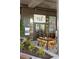 Modern restaurant exterior featuring a sleek design, outdoor seating, and lush landscaping at 22 Airline Ne St # 201, Atlanta, GA 30312