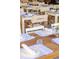 Charming table setting with light blue linens, white plates, and elegant glassware for a refined dining experience at 22 Airline Ne St # 201, Atlanta, GA 30312