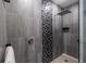 Spa-like walk-in shower with modern tile and rainfall shower head, offering a luxurious bathing experience at 399 Pratt Se Dr, Atlanta, GA 30315