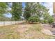 Large backyard features a play area and patio, perfect for outdoor entertaining at 568 Musical Ct, Lawrenceville, GA 30044