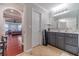 Bathroom with gray vanity and a view to a bedroom at 568 Musical Ct, Lawrenceville, GA 30044