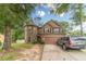 Charming two-story home featuring stone accents and a two-car garage, nestled on a lush lot at 568 Musical Ct, Lawrenceville, GA 30044