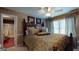 Cozy bedroom with comfortable bed, natural light, and ensuite bathroom access at 2901 Briscoe Rd, Loganville, GA 30052