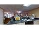 Efficient kitchen with open layout to the living room and basic appliances at 2901 Briscoe Rd, Loganville, GA 30052
