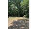 A spacious and grassy land area is perfect for a backyard or recreation space at 2901 Briscoe Rd, Loganville, GA 30052