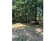Expansive grassy land with beautiful tree cover offering privacy and natural beauty at 2901 Briscoe Rd, Loganville, GA 30052