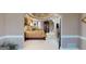 Spacious main bedroom featuring tray ceilings, a cozy seating area, and elegant decor at 2901 Briscoe Rd, Loganville, GA 30052
