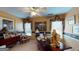 Well-appointed home office with dual windows, a large desk, and classic decor at 2901 Briscoe Rd, Loganville, GA 30052
