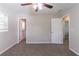 Bedroom with neutral walls, carpet flooring, and access to the bathroom at 2957 Browns Mill Se Rd, Atlanta, GA 30354