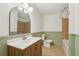 Bathroom with modern vanity, white countertop, and tiled shower at 355 Winding River Dr # B, Atlanta, GA 30350