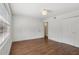 Bright bedroom with white walls and flooring and modern closet at 355 Winding River Dr # B, Atlanta, GA 30350