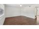 Large bedroom featuring hardwood floors, closet, and ample space at 355 Winding River Dr # B, Atlanta, GA 30350