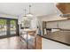 Modern kitchen with gray cabinets, stainless steel appliances, and black countertops at 355 Winding River Dr # B, Atlanta, GA 30350