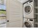 Stackable washer and dryer in a laundry closet at 355 Winding River Dr # B, Atlanta, GA 30350