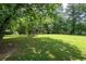 Spacious backyard with a playset, perfect for outdoor Gathering fun at 76 Vaughn Ne Rd, Cartersville, GA 30121