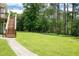 A spacious and well-maintained backyard is perfect for outdoor activities and enjoying nature at 76 Vaughn Ne Rd, Cartersville, GA 30121