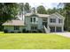 Inviting home exterior featuring a well-manicured lawn and a classic design at 76 Vaughn Ne Rd, Cartersville, GA 30121