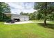 Spacious three-car garage and carport, perfect for car enthusiasts or extra storage at 76 Vaughn Ne Rd, Cartersville, GA 30121