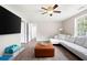 The finished living area includes vinyl flooring, a flat-screen television, and multiple entrances at 76 Vaughn Ne Rd, Cartersville, GA 30121