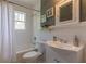 Bright bathroom featuring a tub, vanity and a large mirror to create a more spacious feel at 1391 Jefferson Ave, East Point, GA 30344