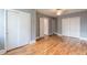 This bedroom offers plenty of closet space and hardwood floors at 1391 Jefferson Ave, East Point, GA 30344