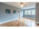 This bedroom offers hardwood floors and natural light at 1391 Jefferson Ave, East Point, GA 30344