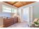 This bedroom includes built-in storage and natural light at 1391 Jefferson Ave, East Point, GA 30344