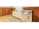 Vintage upstairs kitchen with retro oven and floral linoleum at 1391 Jefferson Ave, East Point, GA 30344