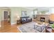 Inviting living room with hardwood floors, fireplace, comfortable seating, and ample natural light at 1391 Jefferson Ave, East Point, GA 30344