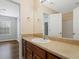 Bathroom featuring wood vanity, large mirror, and shower/tub at 174 Randall Dr, Rockmart, GA 30153