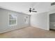 Spacious bedroom with plush carpet and natural light streaming through the windows at 174 Randall Dr, Rockmart, GA 30153