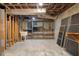 Unfinished basement space with concrete floors and walls, featuring utilities and ready for customization at 3228 Turtle Lake Se Dr, Marietta, GA 30067